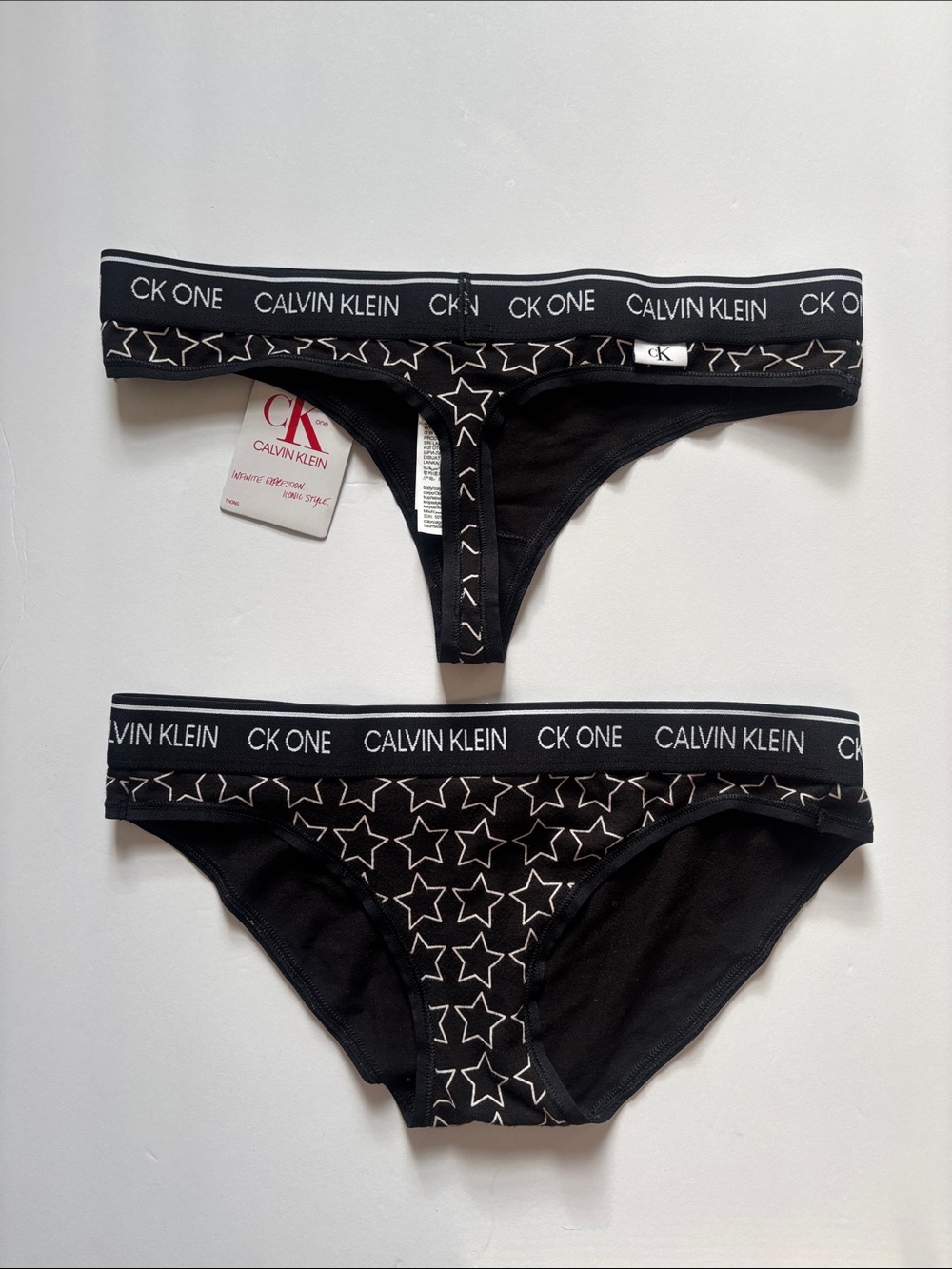 Calvin Klein Black & White Star Print Bralette, Brief & Thong Set - Picture 2 of 4